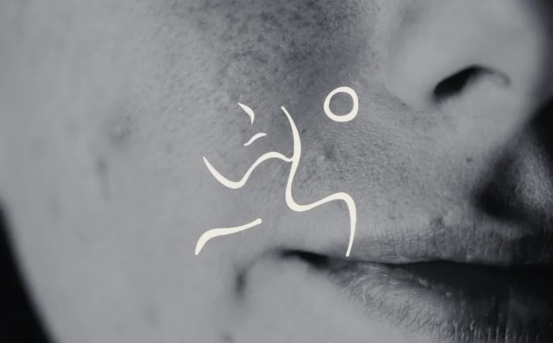 Zoom sur peau irritée et le pictogramme visage