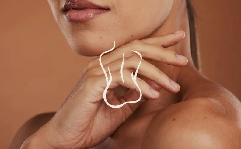 Zoom brut sur la peau d'une femme et un pictogramme de corps